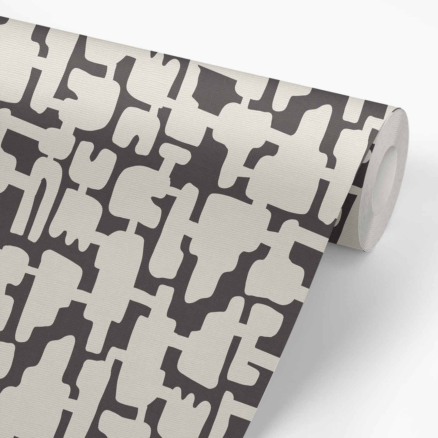 Add some eye-catching style to your walls with our Abstract Shapes Wallpaper! This modern design features an intricate blend of beige shapes on a charcoal background.