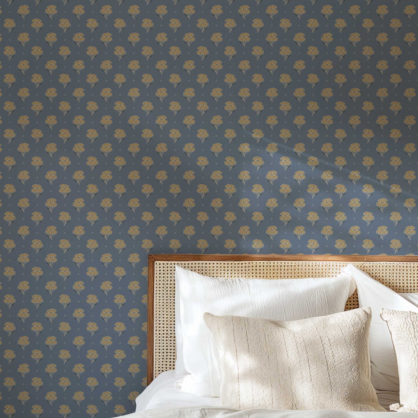 Antique Poppy Wallpaper in Blue shown in a bedroom.