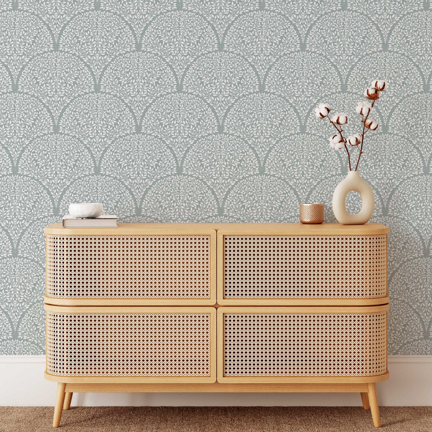 Arched Leaves Wallpaper in Soft Teal shown in a living room