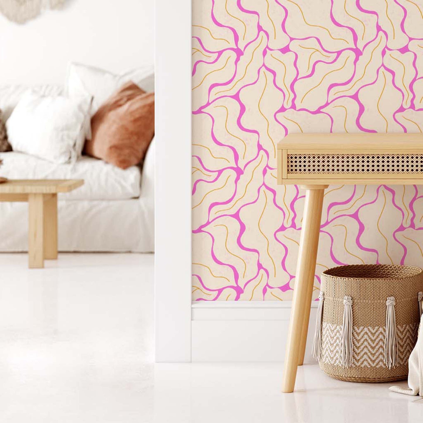 Living Room featuring our Modern Leaves Wallpaper in Magenta by artist Brenda Bird for Ayara