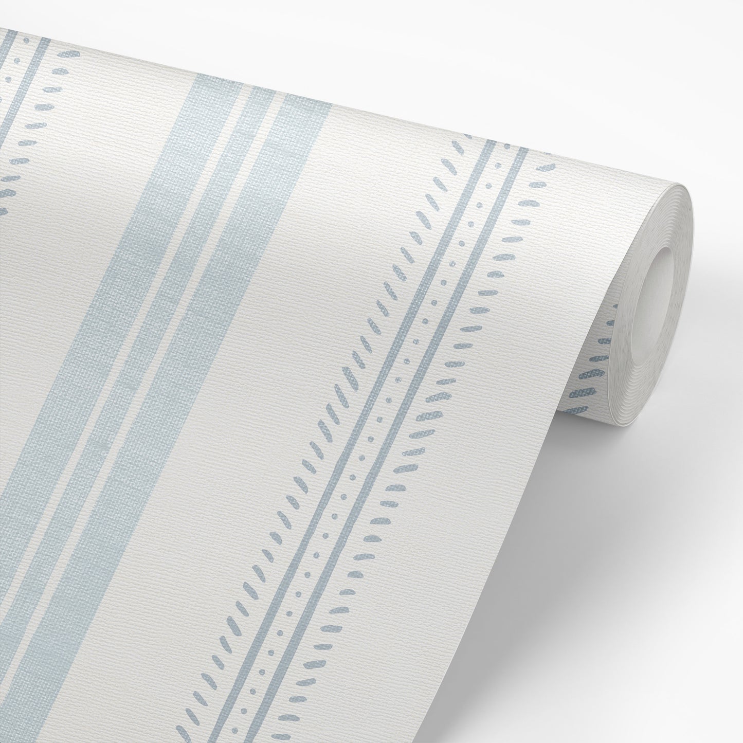 Antique Linen Stripe Wallpaper in Cream on Hinting Blue shown on a wallpaper roll.