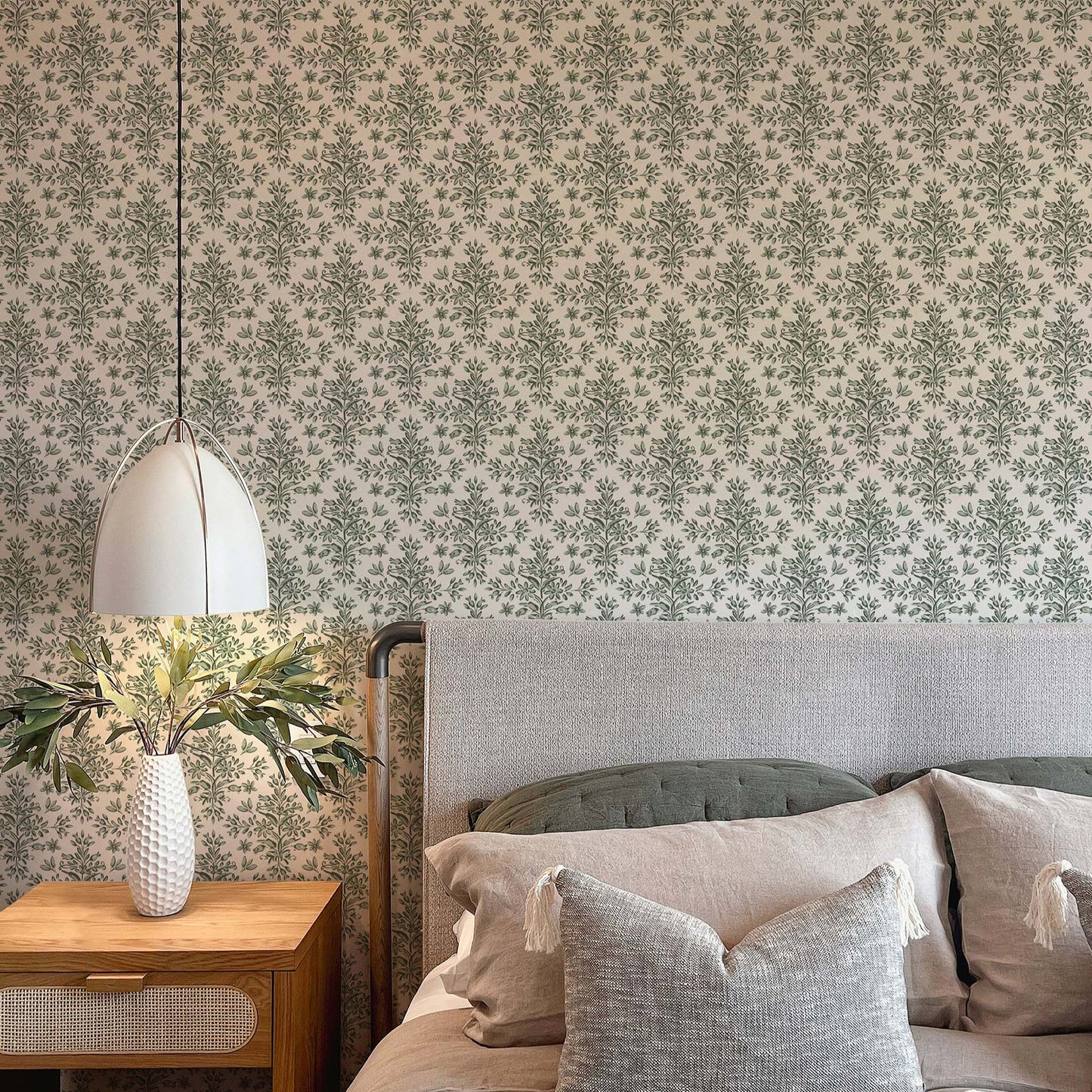 Rustic Lacy Wallpaper in Antique Jade shown in a bedroom