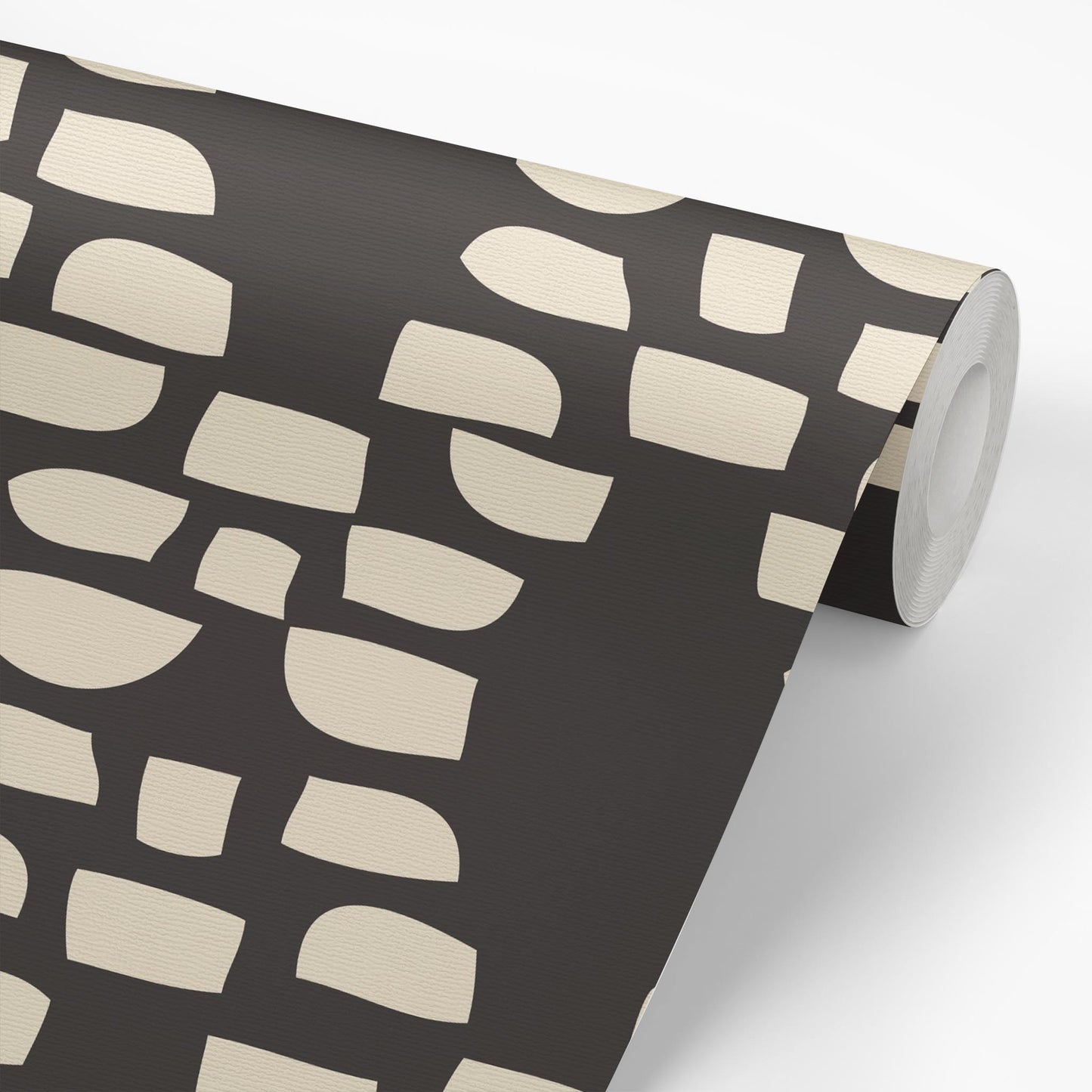 Sample roll of Incan Trellis Wallpaper in Black by artist Brenda Bird