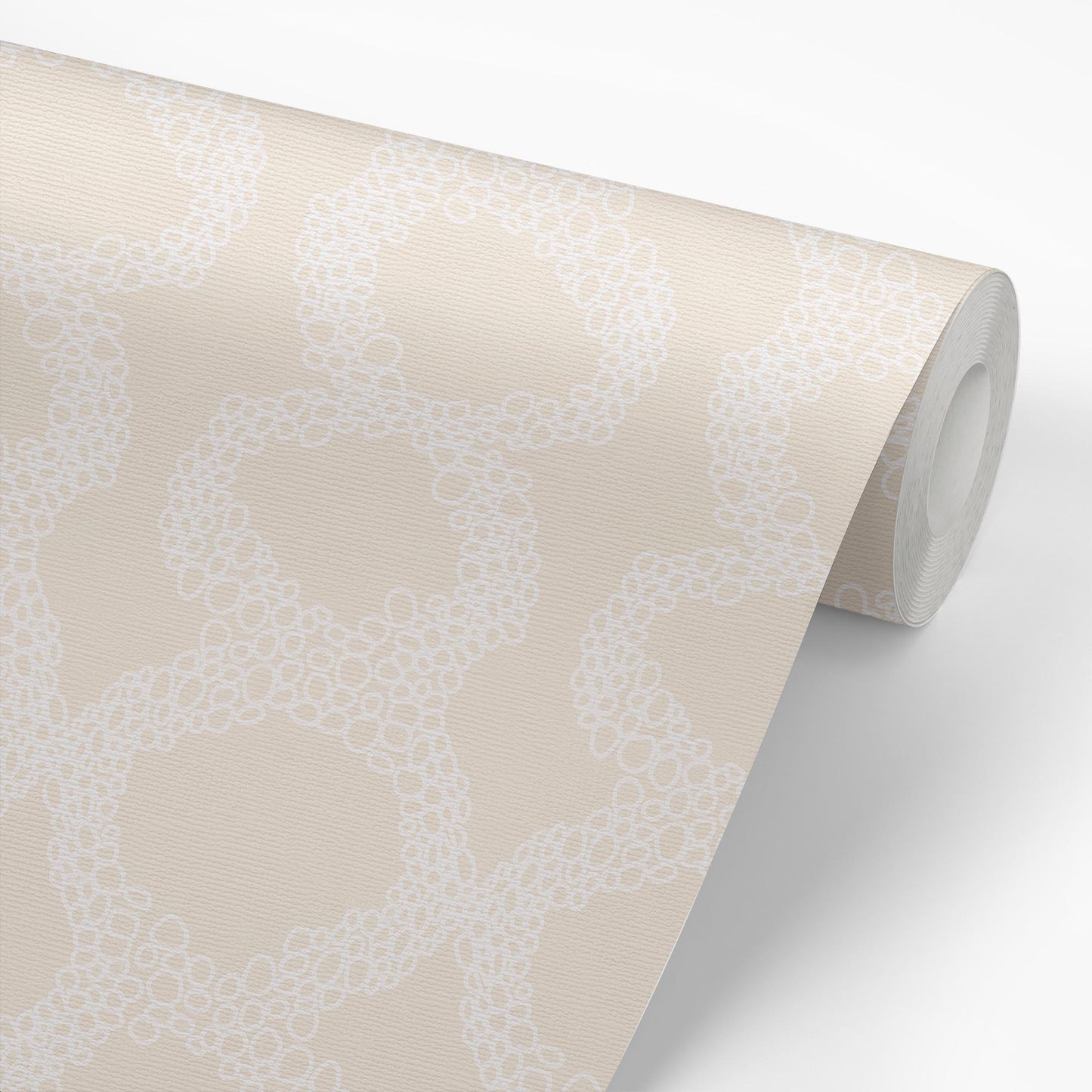 Sample roll of Circles Wallpaper in Cream by artist Brenda Bird