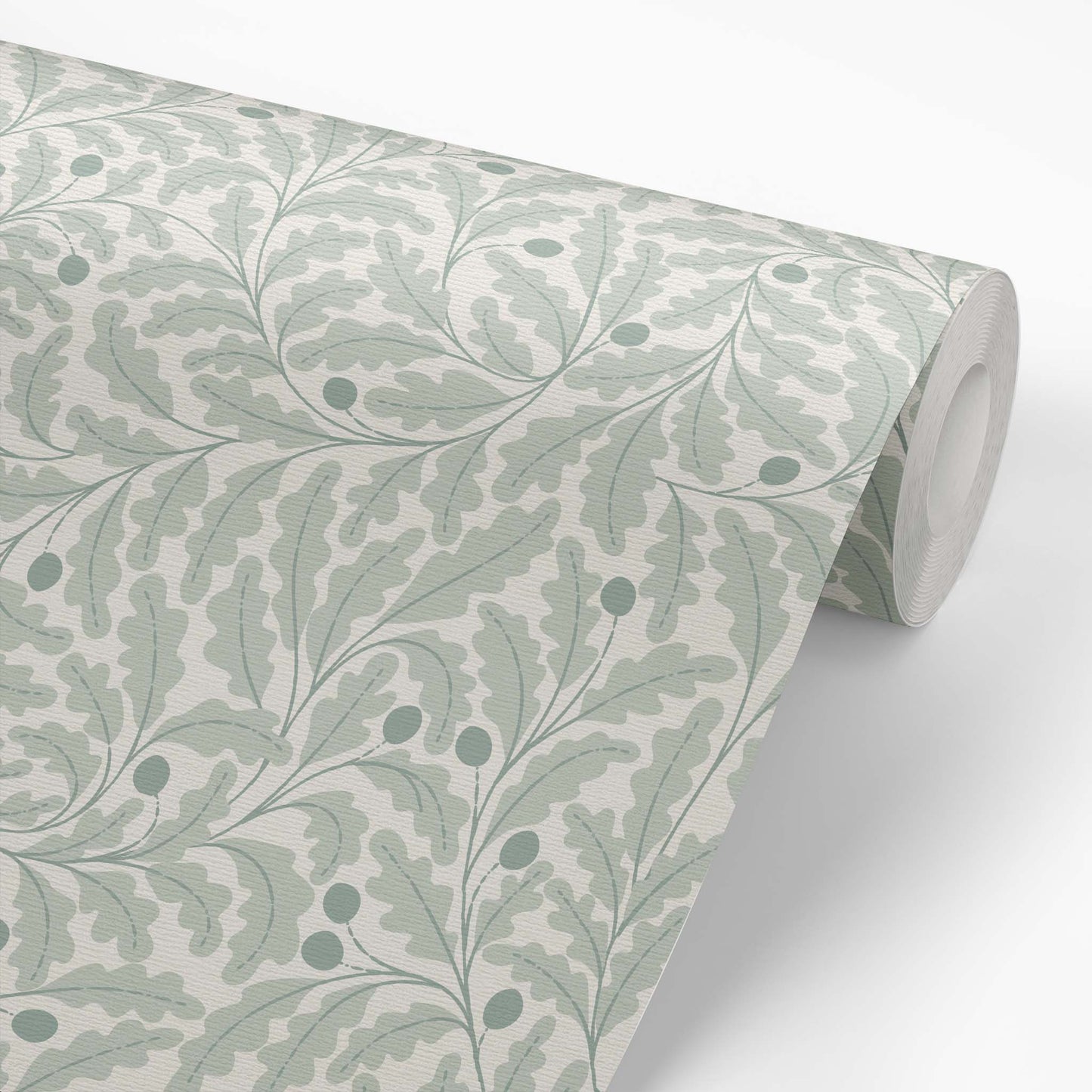 Roll of wallpaper with a leaf pattern in blue green