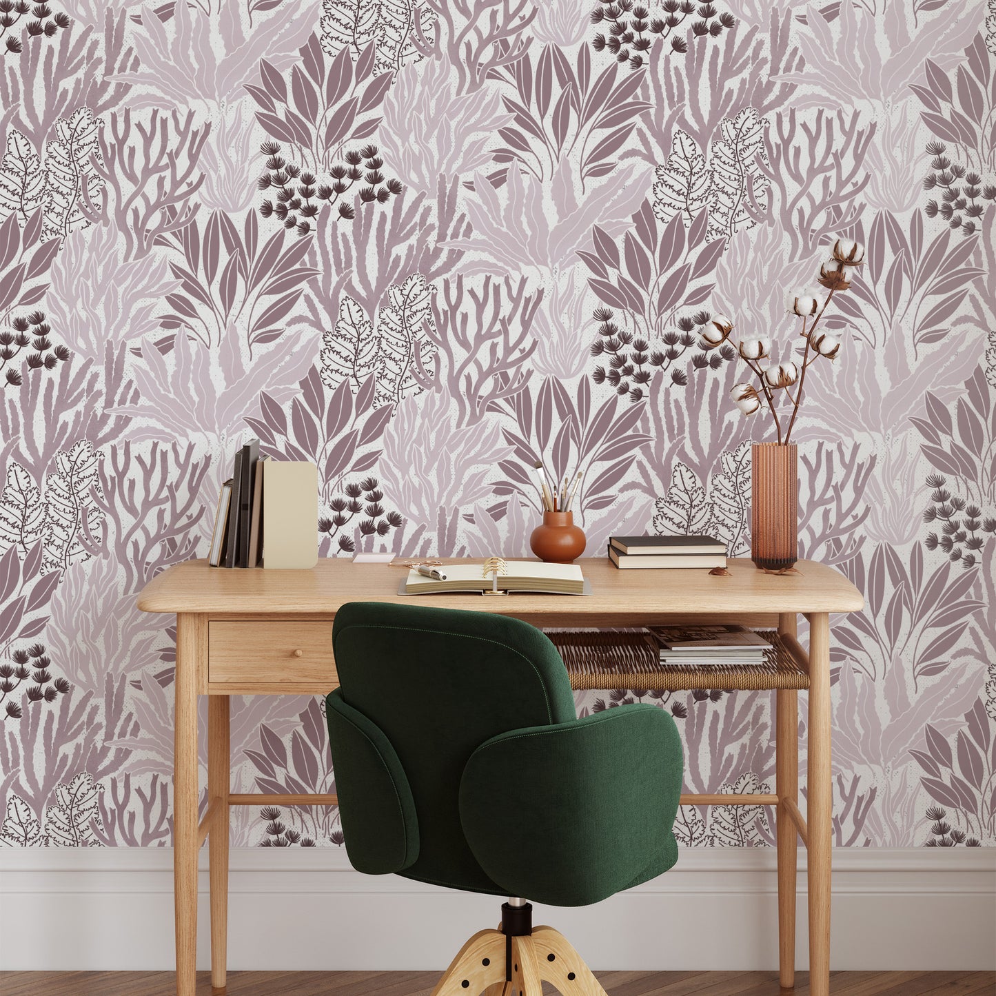 Coral Garden Wallpaper in Rosy Purple shown behind a desk