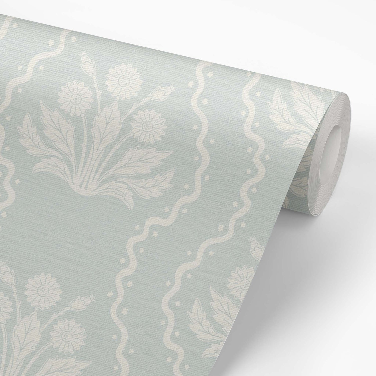 Dandelion Block Printed Wallpaper in Seafoam shown on a wallpaper roll.