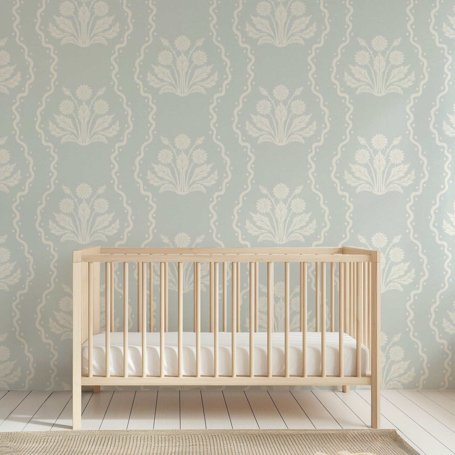 Dandelion Block Printed Wallpaper in Seafoam shown in a nursery.