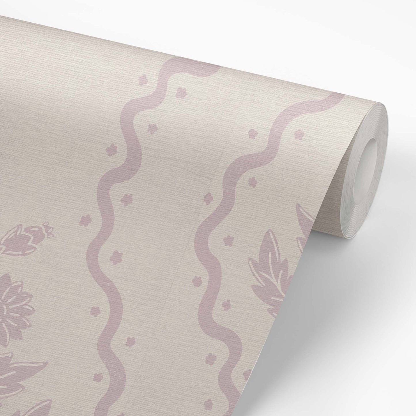 Dandelion Block Printed Wallpaper in Rose shown on a wallpaper roll.