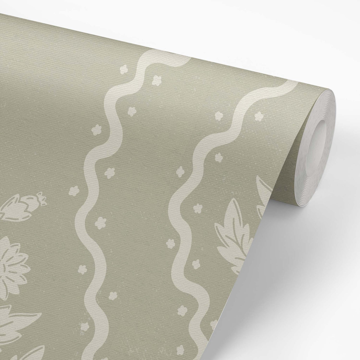 Dandelion Block Printed Wallpaper in Cream on Dry Sage shown on a wallpaper roll.