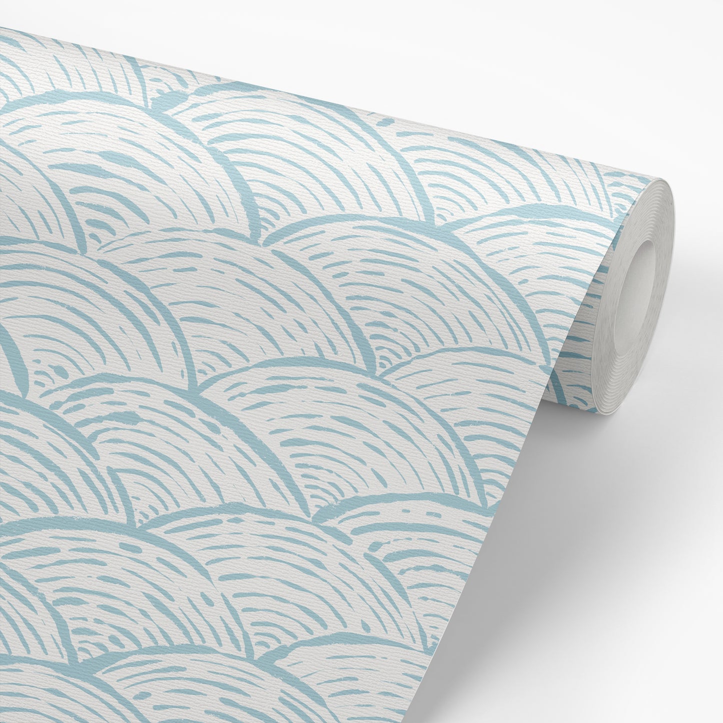 Scallops Wallpaper in Blue shown on a roll of wallpaper.