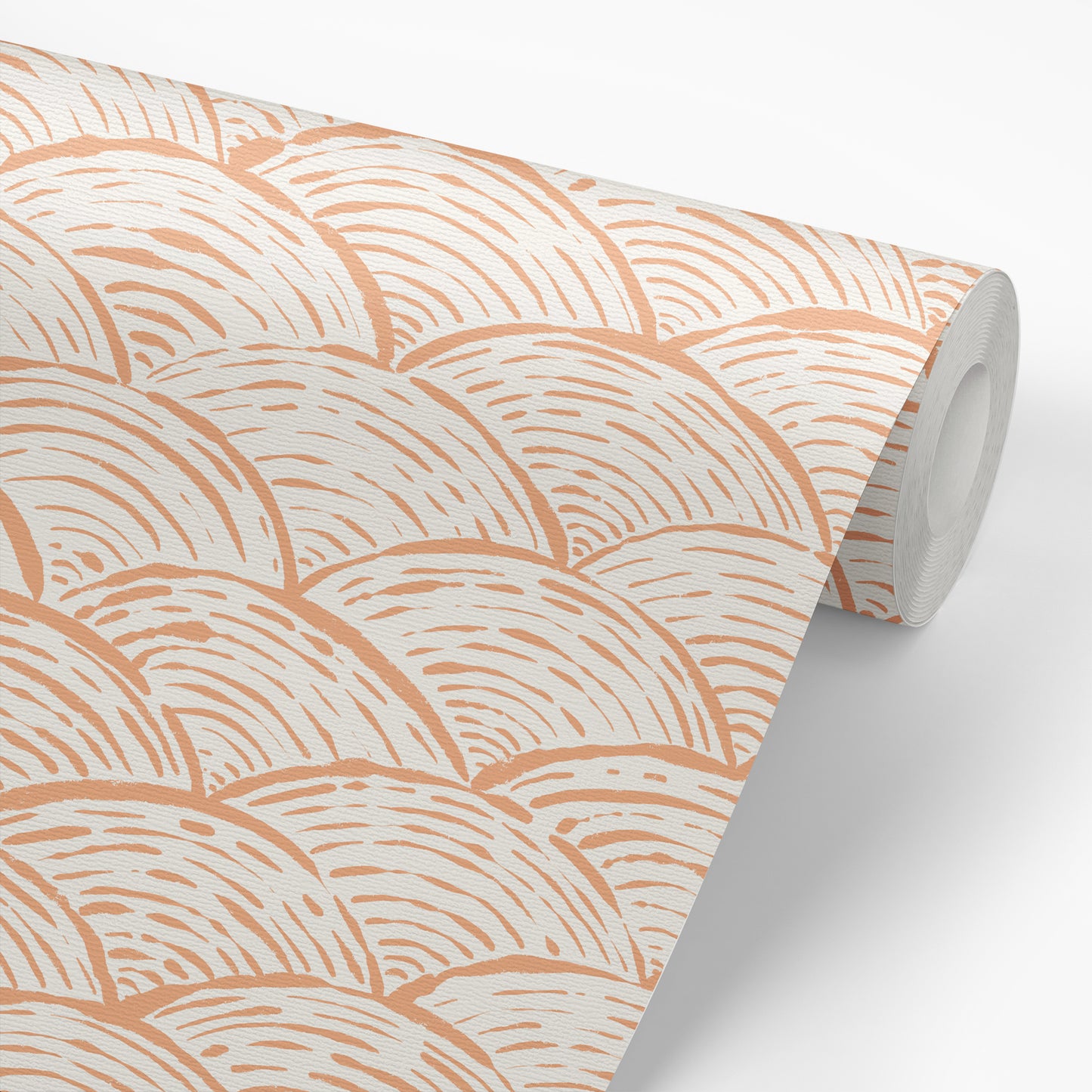 Scallops Wallpaper in Apricot shown on a roll of wallpaper.