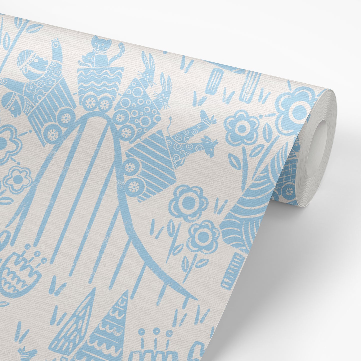 In the Theme Park Wallpaper in Blue shown on a roll of wallpaper.