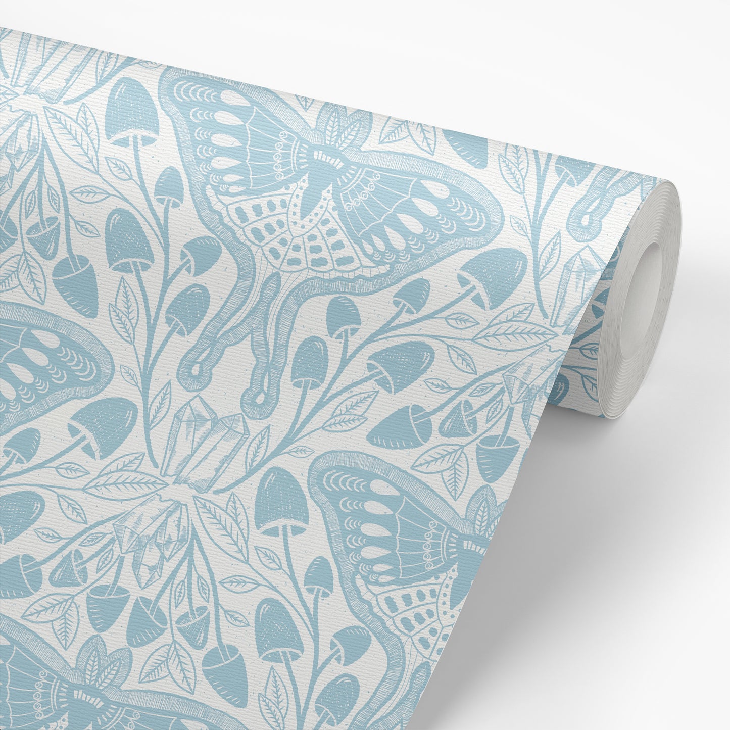 Luna Moths Wallpaper in Blue shown on a roll of wallpaper.