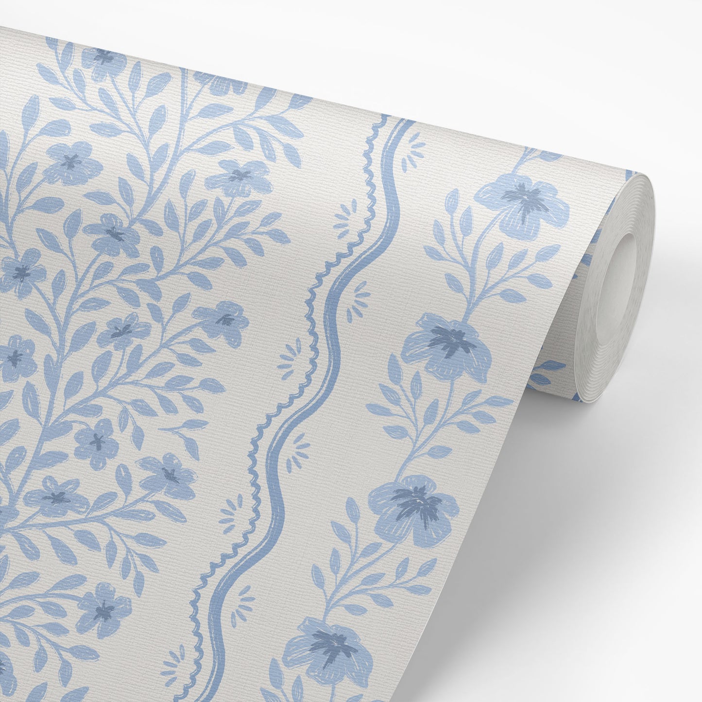Etta Wallpaper in blue shown on a wallpaper roll.
