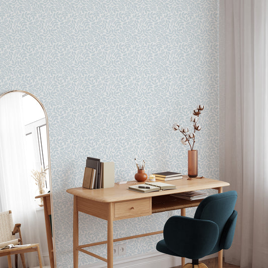 Adorn your walls with our luxurious Falling Leaves Wallpaper in Cloudy Sky Blue. The scattered flowers add a subtle touch of elegance, while the soft blue hue brings a calming and sophisticated atmosphere to any room shown in a full size image.