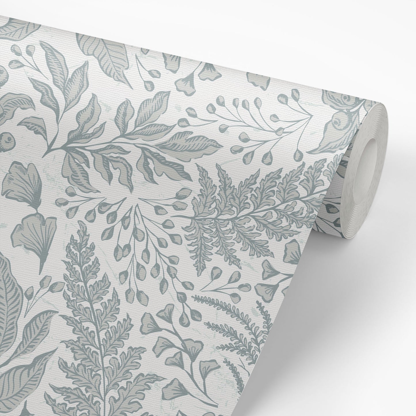 Roll of wallpaper with a leaf pattern on a white background