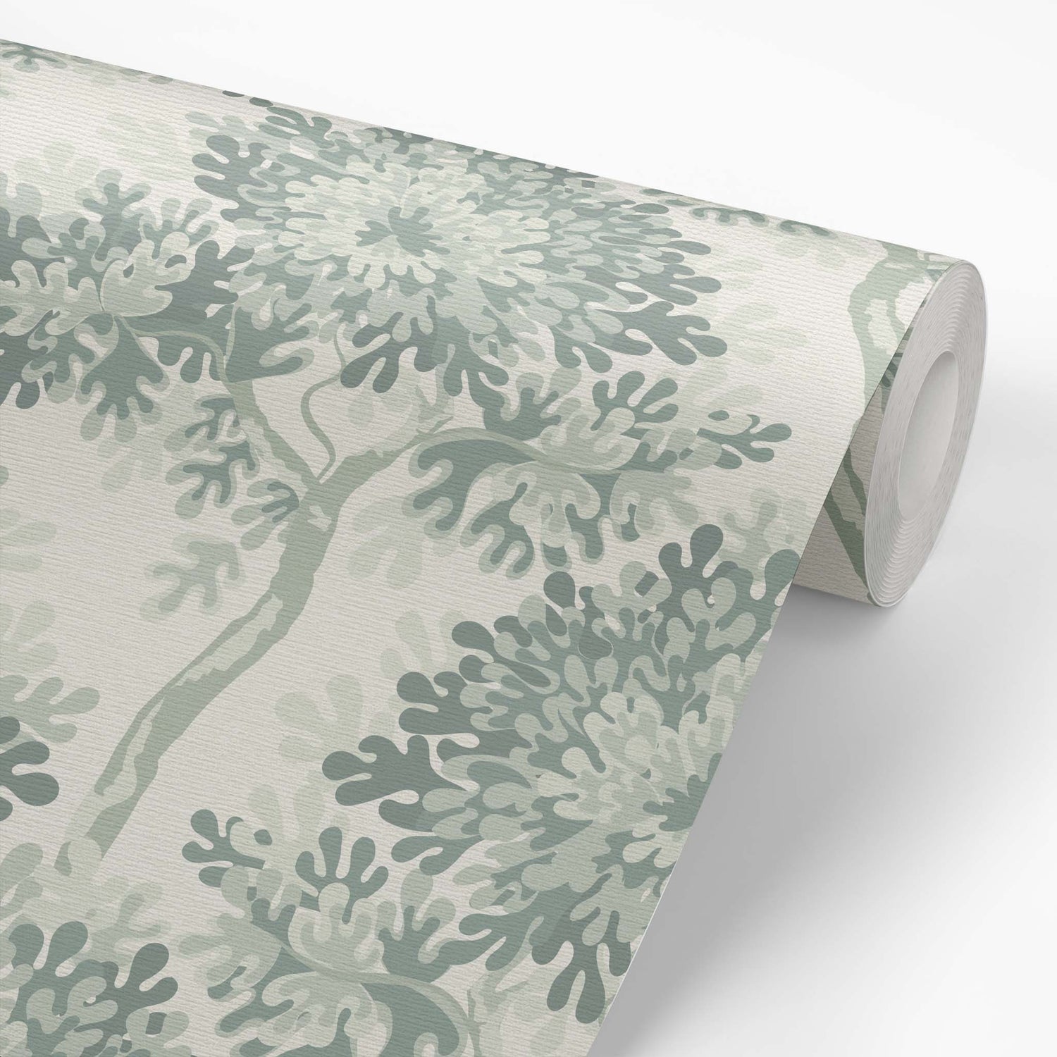 Roll of wallpaper with green coral pattern on a white background