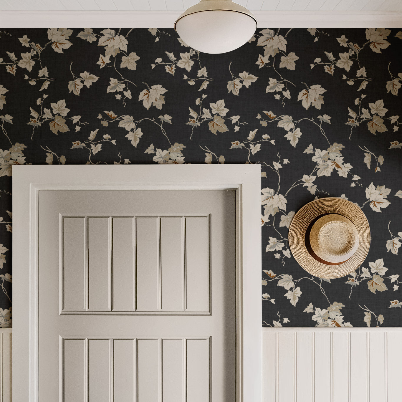 Climbing Ivy Wallpaper in Ash shown in a hallway