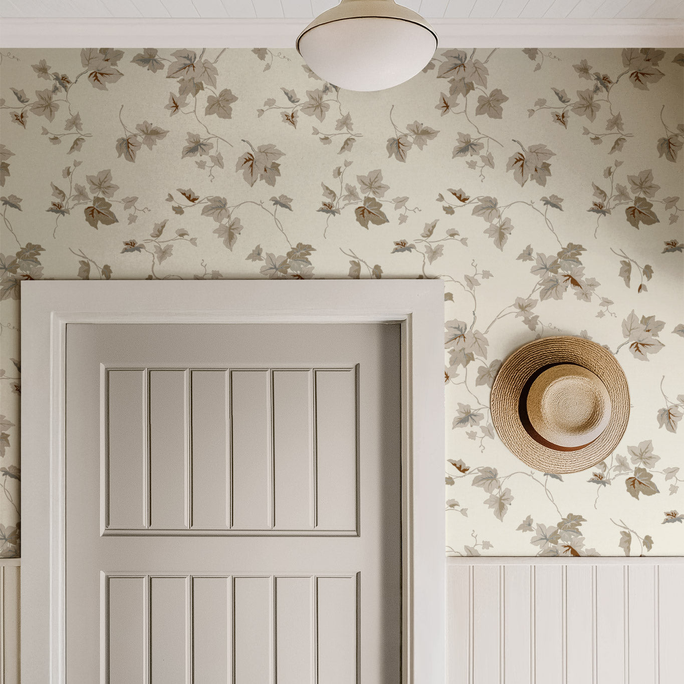 Climbing Ivy Wallpaper in Butter shown in a hallway