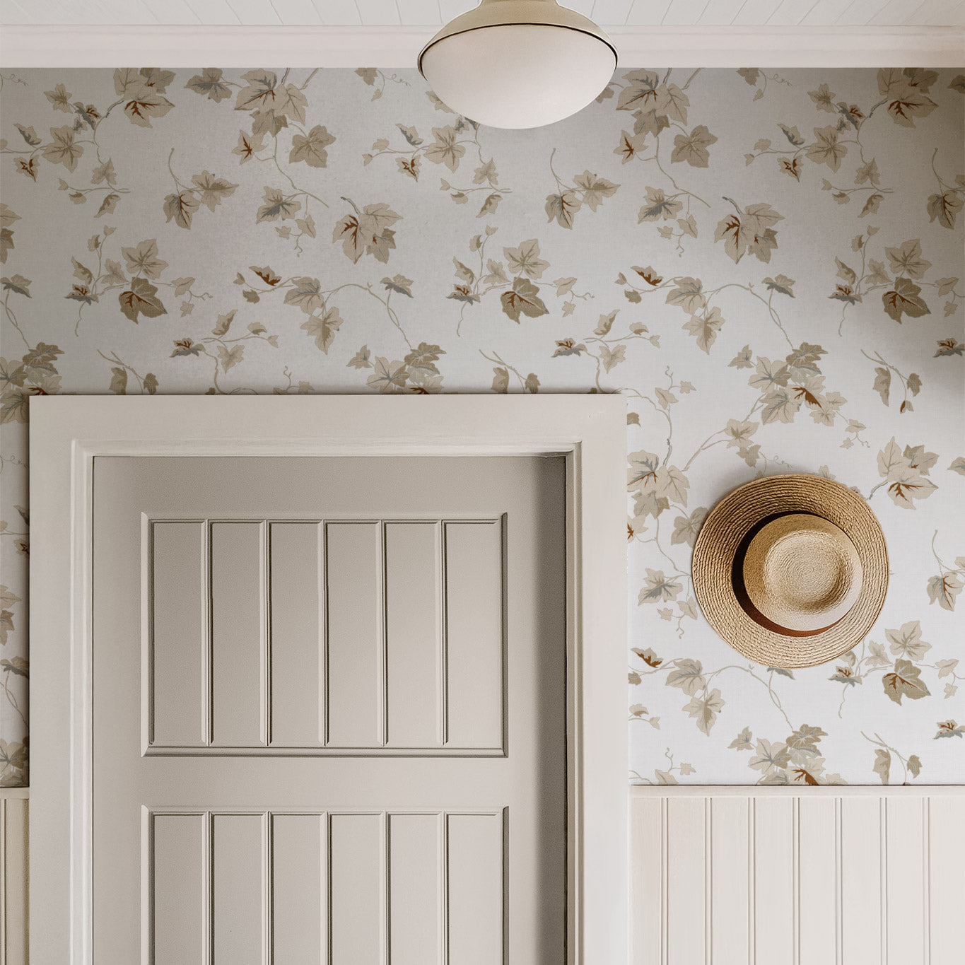 Climbing Ivy Wallpaper in Portland Gray shown in a hallway