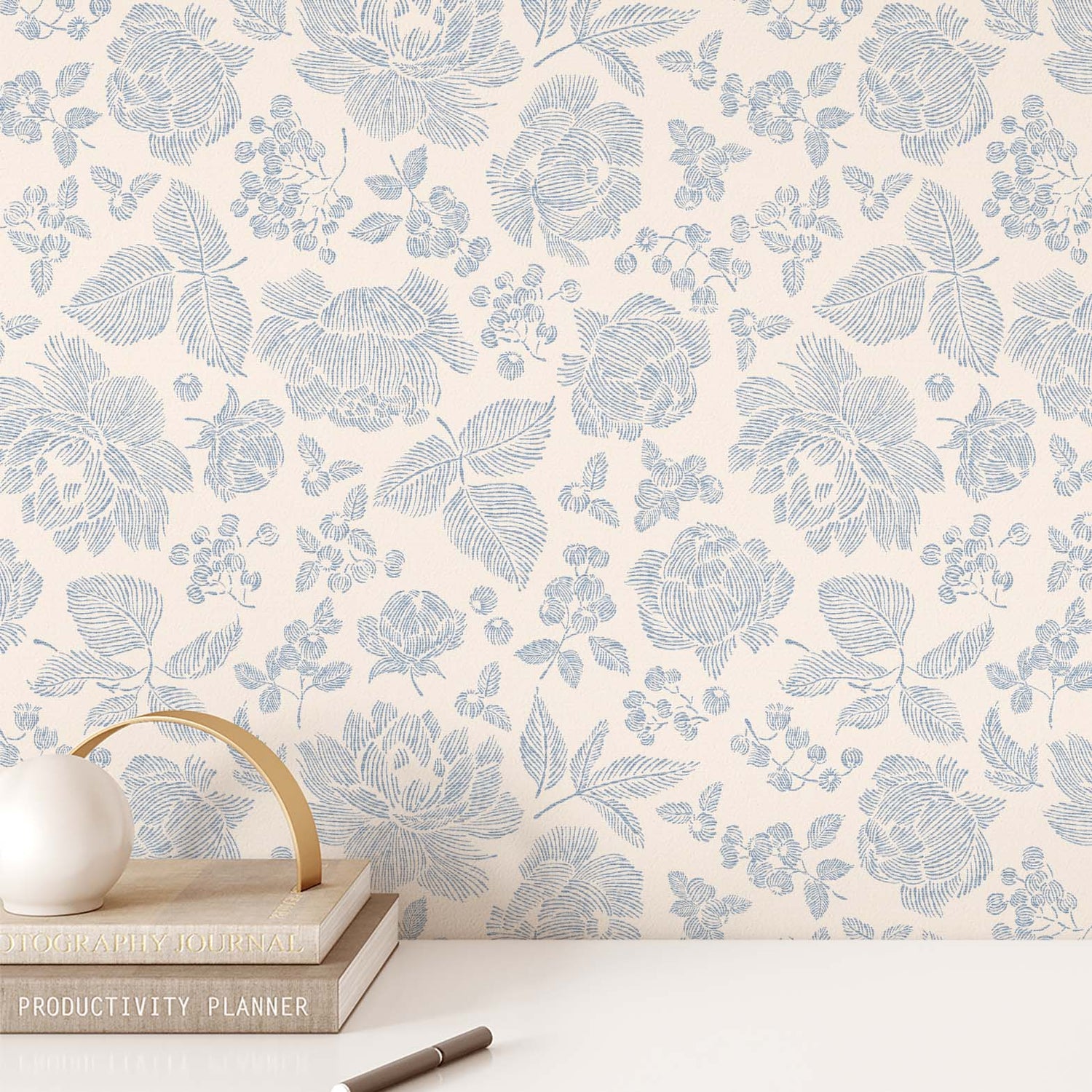 Infuse your walls with classic elegance with our Line Peonies and Berries Wallpaper in China Blue. The delicate blooms of peonies and sweet berries add a touch of sophistication to any room