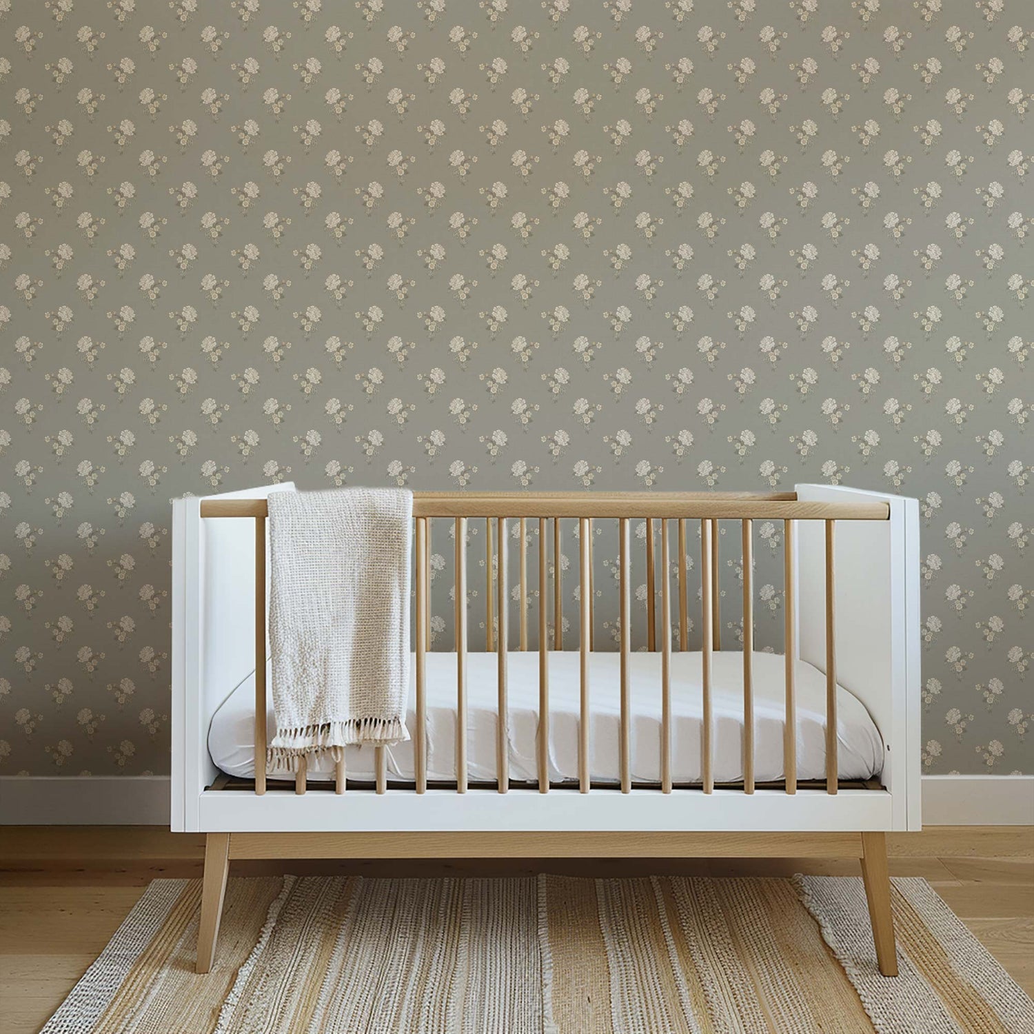 Foraged Peonies Wallpaper in Gray shown in a nursery