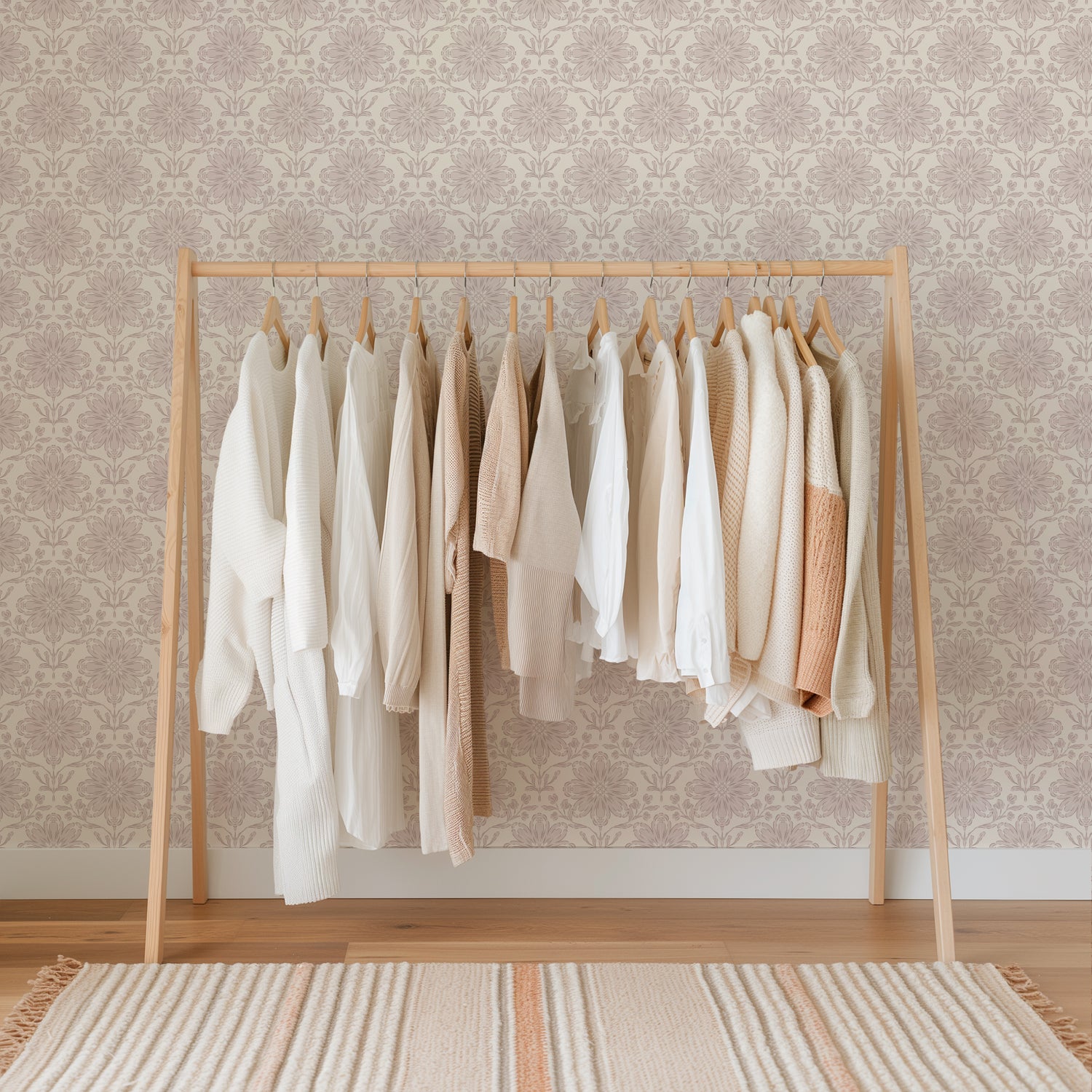 Rosette Wallpaper in Blush shown in a girls closet.