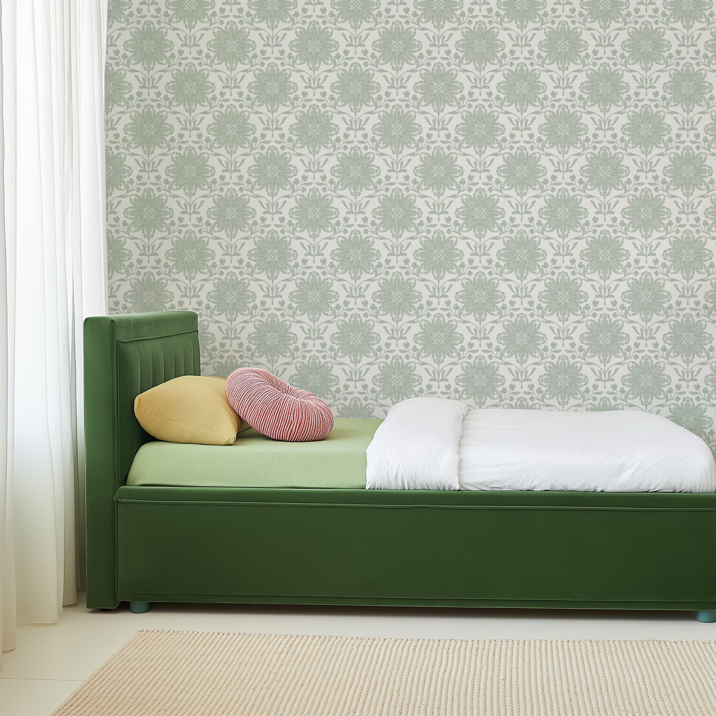 Rosette Wallpaper in Sage shown in a kids bedroom.