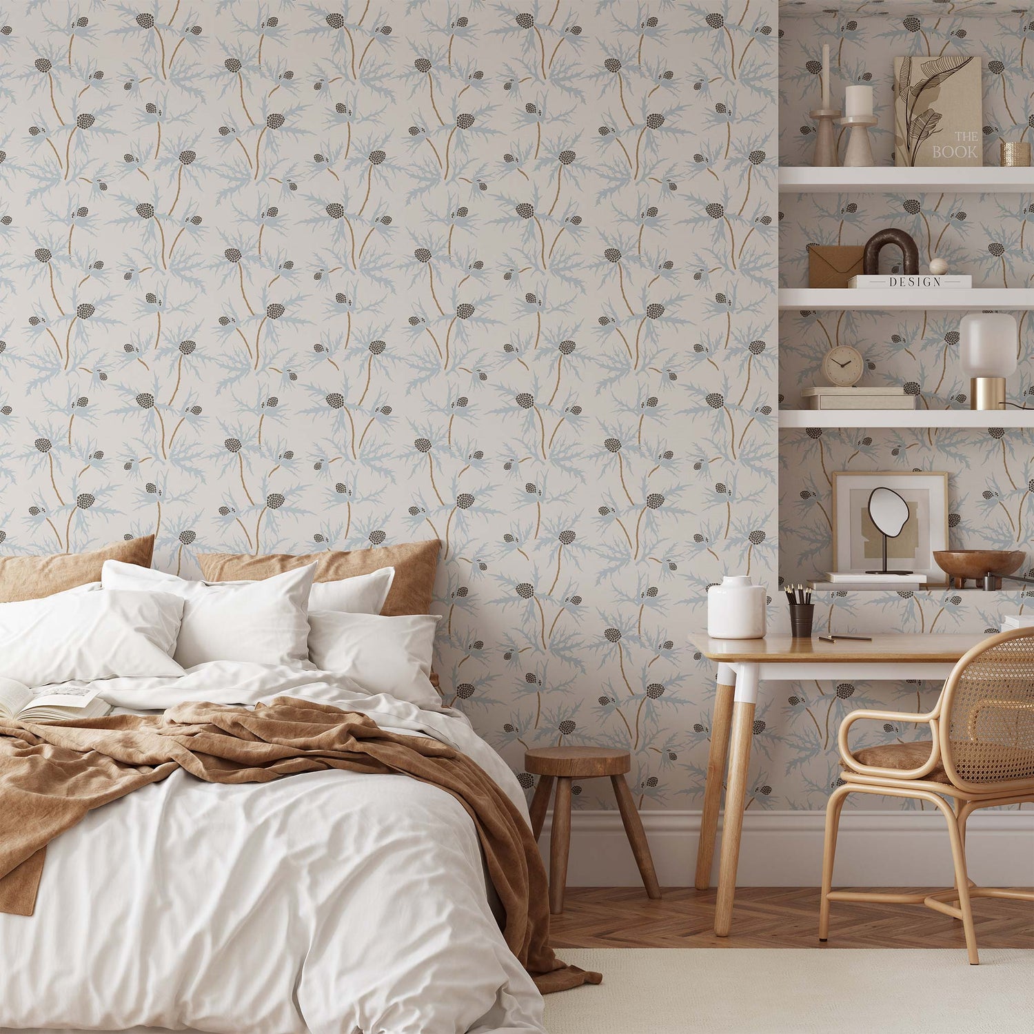Coastal Sea Holly Wallpaper in Blue on Soft Gray shown in a bedroom
