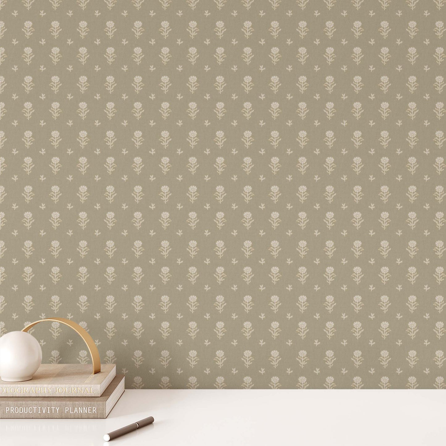 Add a touch of elegance and femininity to any room with our Small Vintage Floral Wallpaper in Sage. Drawing from classic vintage designs, this wallpaper combines delicate florals with soft, subtle tones to create an ambience of comfort and refinement.