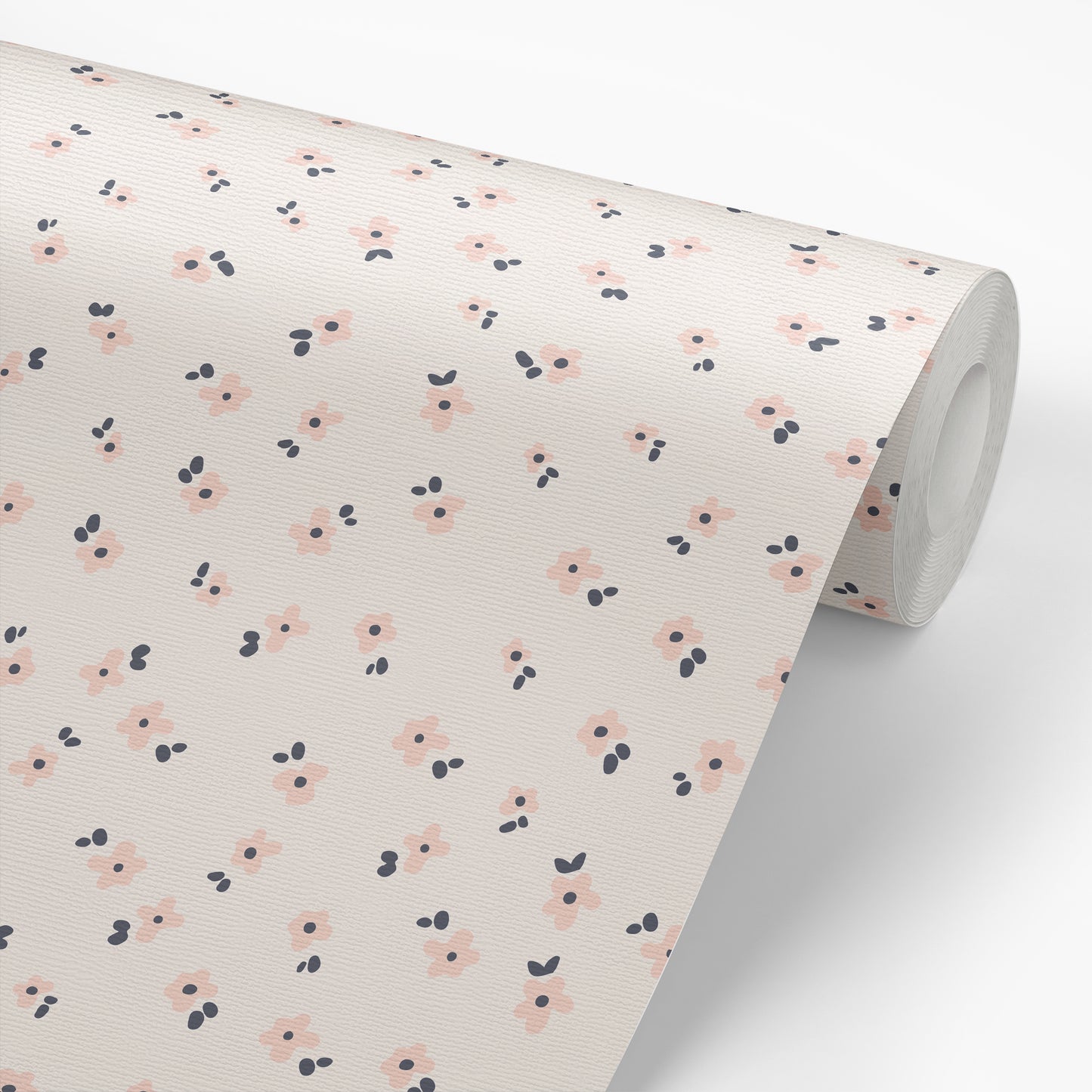 Our Snow in Summer removable peel and stick wallpaper in Blush shown on a roll of wallpaper.