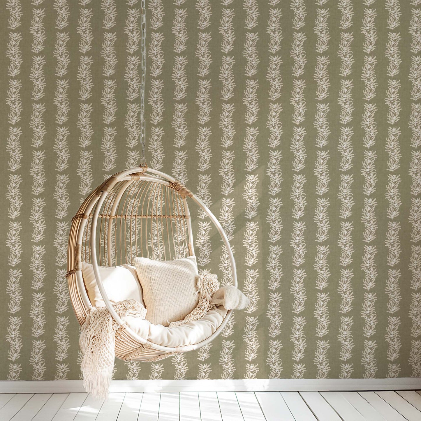Vining Berries Wallpaper in Moss Green shown in a reading room