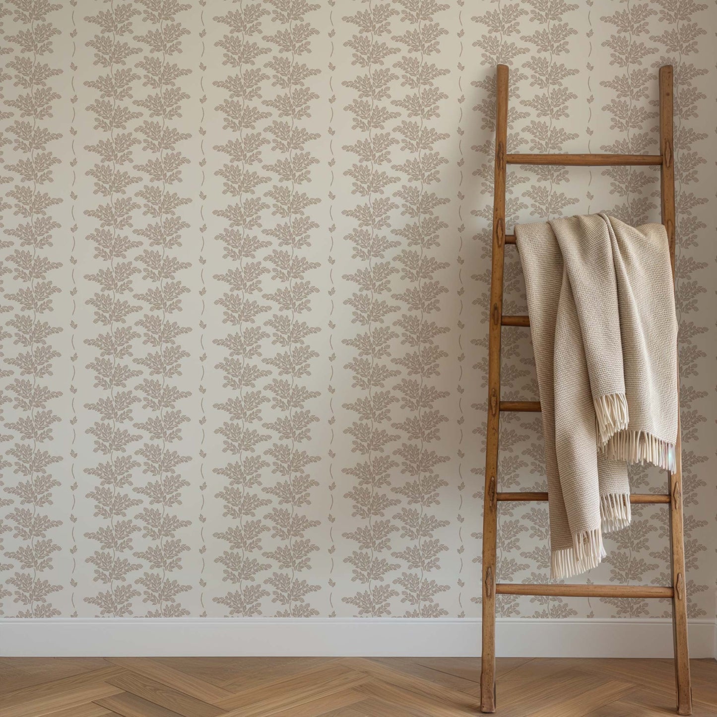 Elegant Branches Wallpaper in Taupe Branches shown on a wall