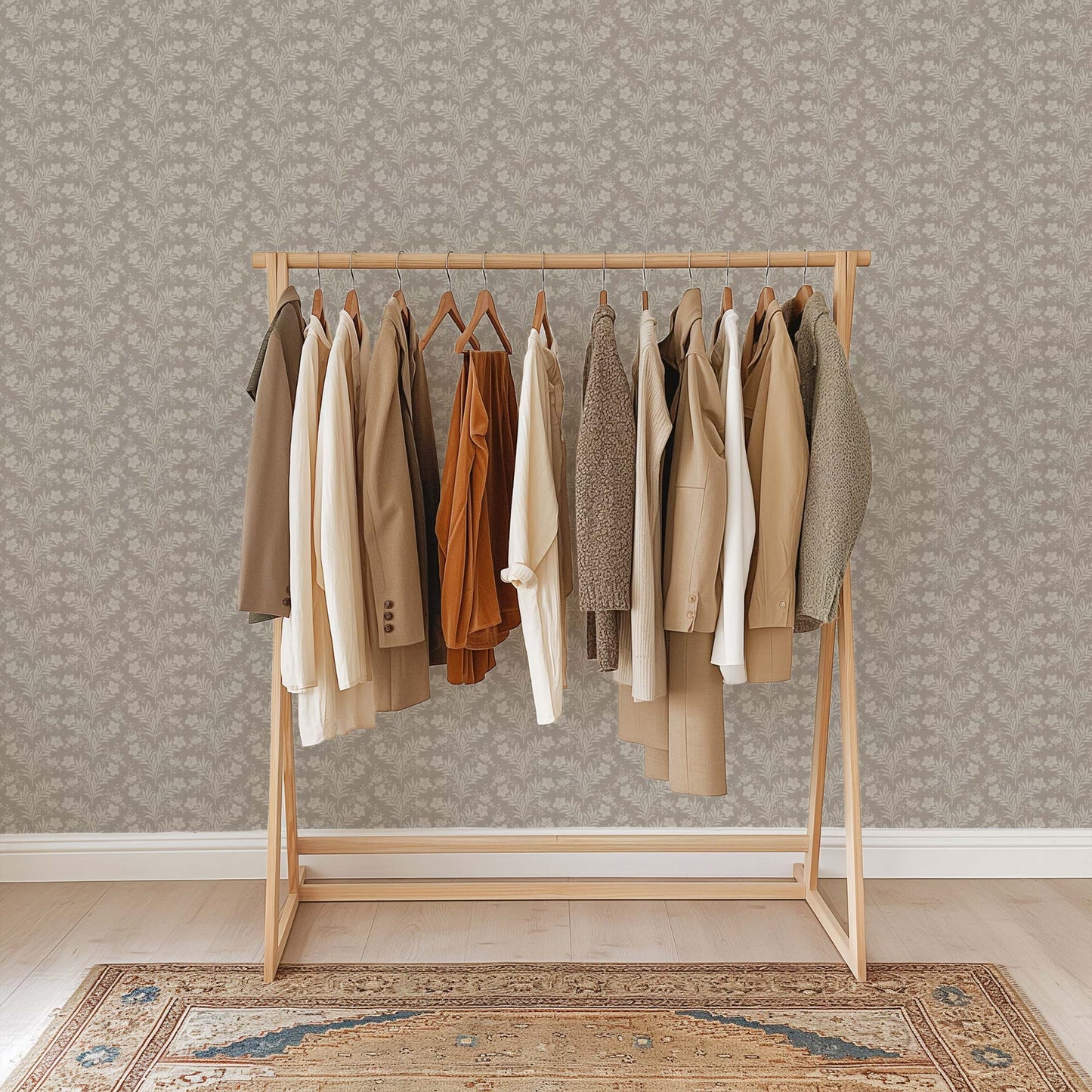 Wildflower Vines Wallpaper in Gray shown in a room.