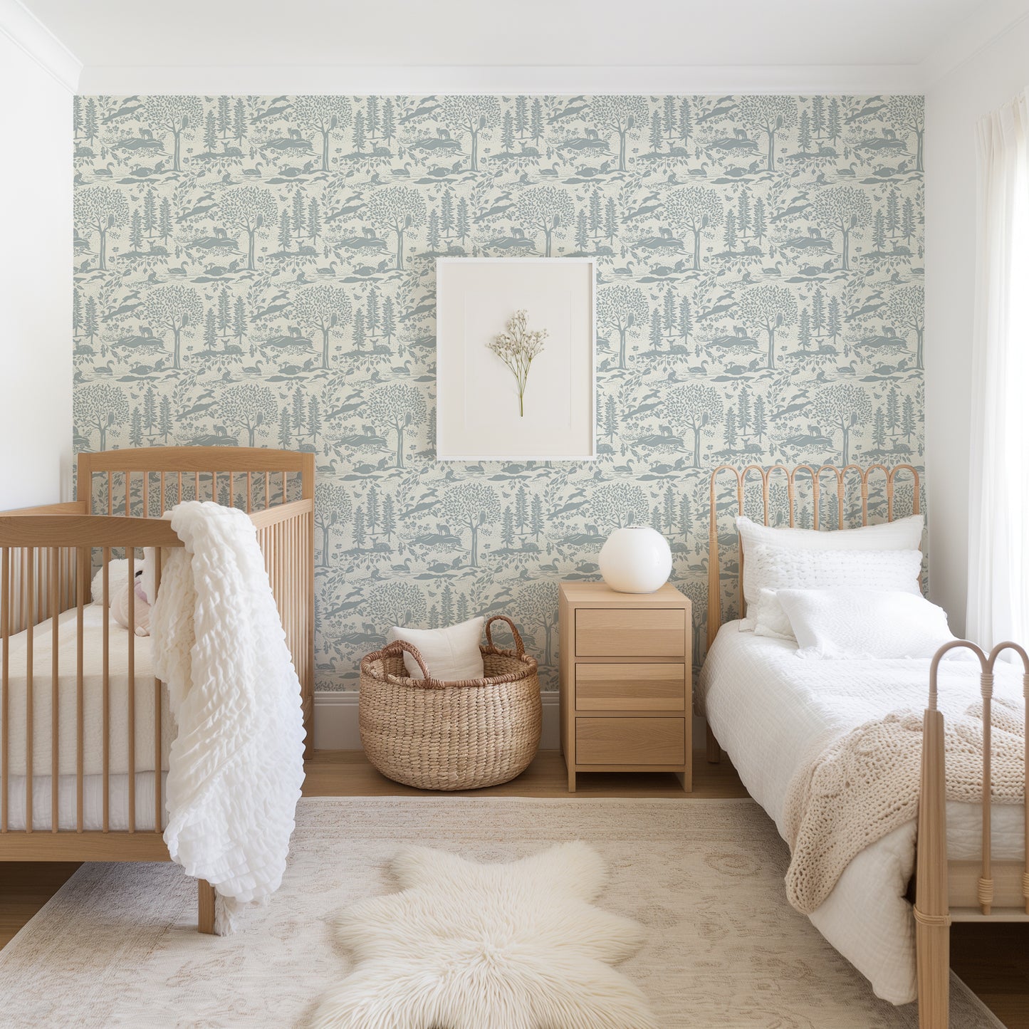 Woodland Meadow Wallpaper in Blue shown in a kids room.