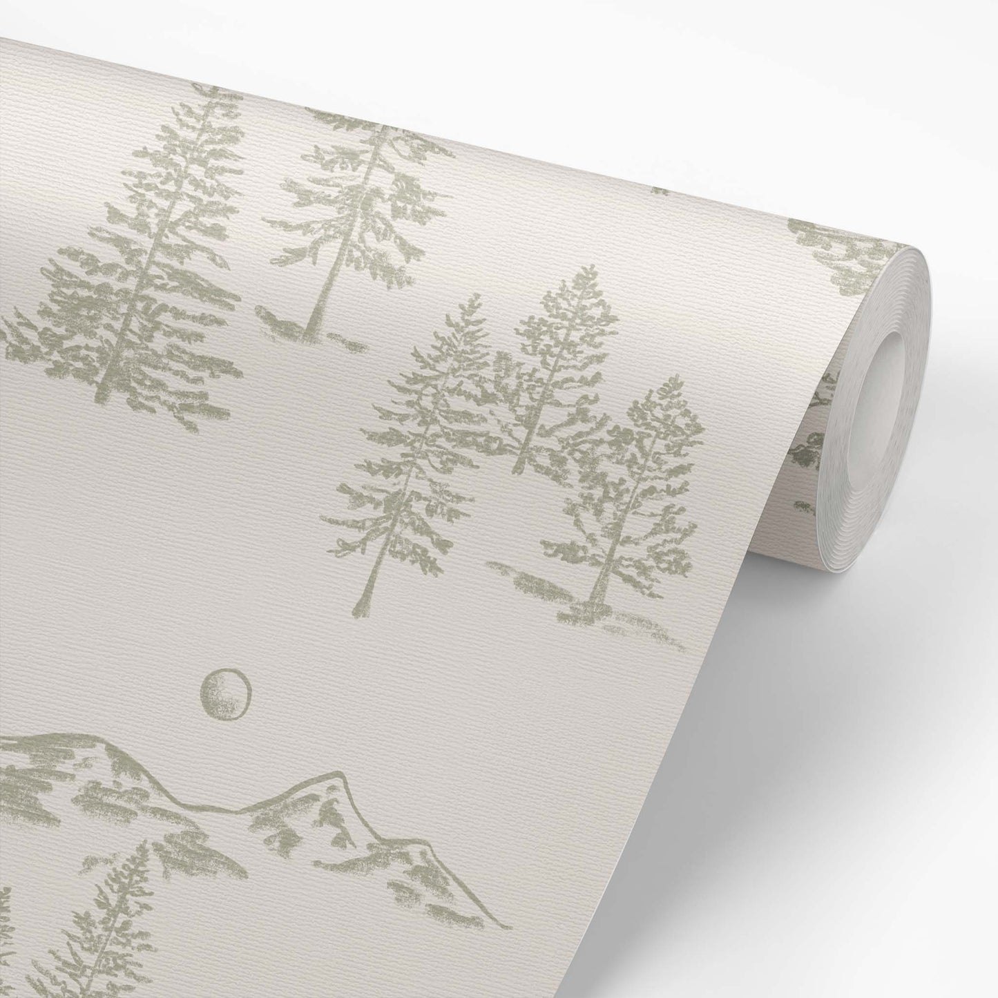 This wallpaper roll shows our Mountain Green Wallpaper in Cream. This peel and stick, removable wallpaper was designed by artist Mariah Cottrell and features beautifully sketched mountains and trees.