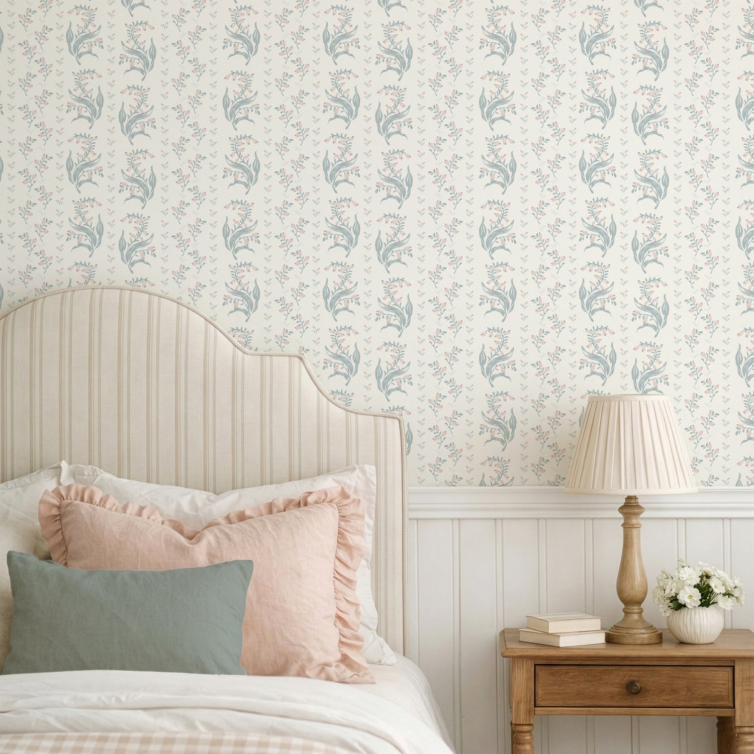 Agnes Wallpaper in Blue shown in a bedroom.