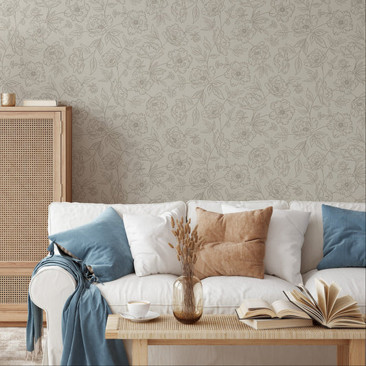 Anemone Blooms Wallpaper in Beige shown in a living room.