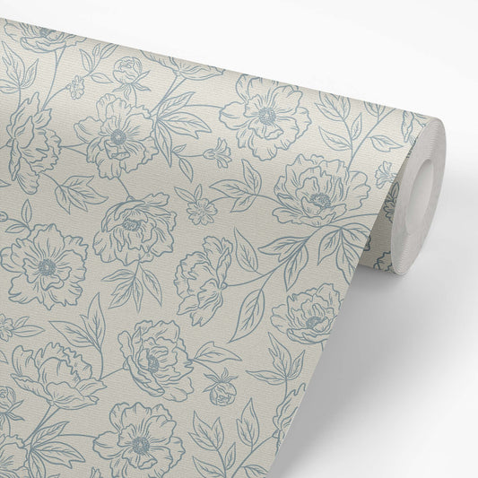 Anemone Blooms Wallpaper in Cloudy Blue shown on a wallpaper roll.