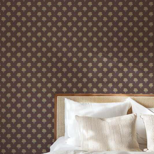 Antique Poppy Wallpaper in Old Burgundy shown in a bedroom.