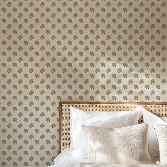 Antique Poppy Wallpaper in Tan shown in a bedroom.