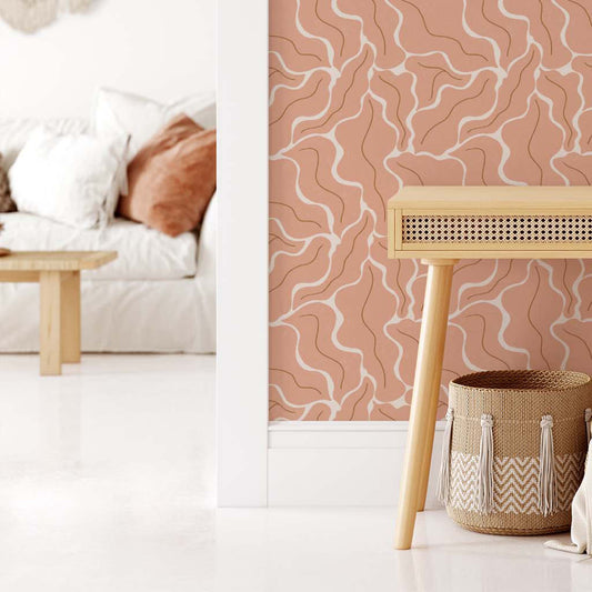 Living Room featuring our Modern Leaves Wallpaper in Salmon by artist Brenda Bird for Ayara