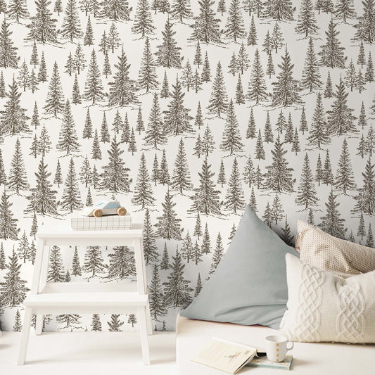 Winter Pines Wallpaper in Cub Brown shown in a bedroom