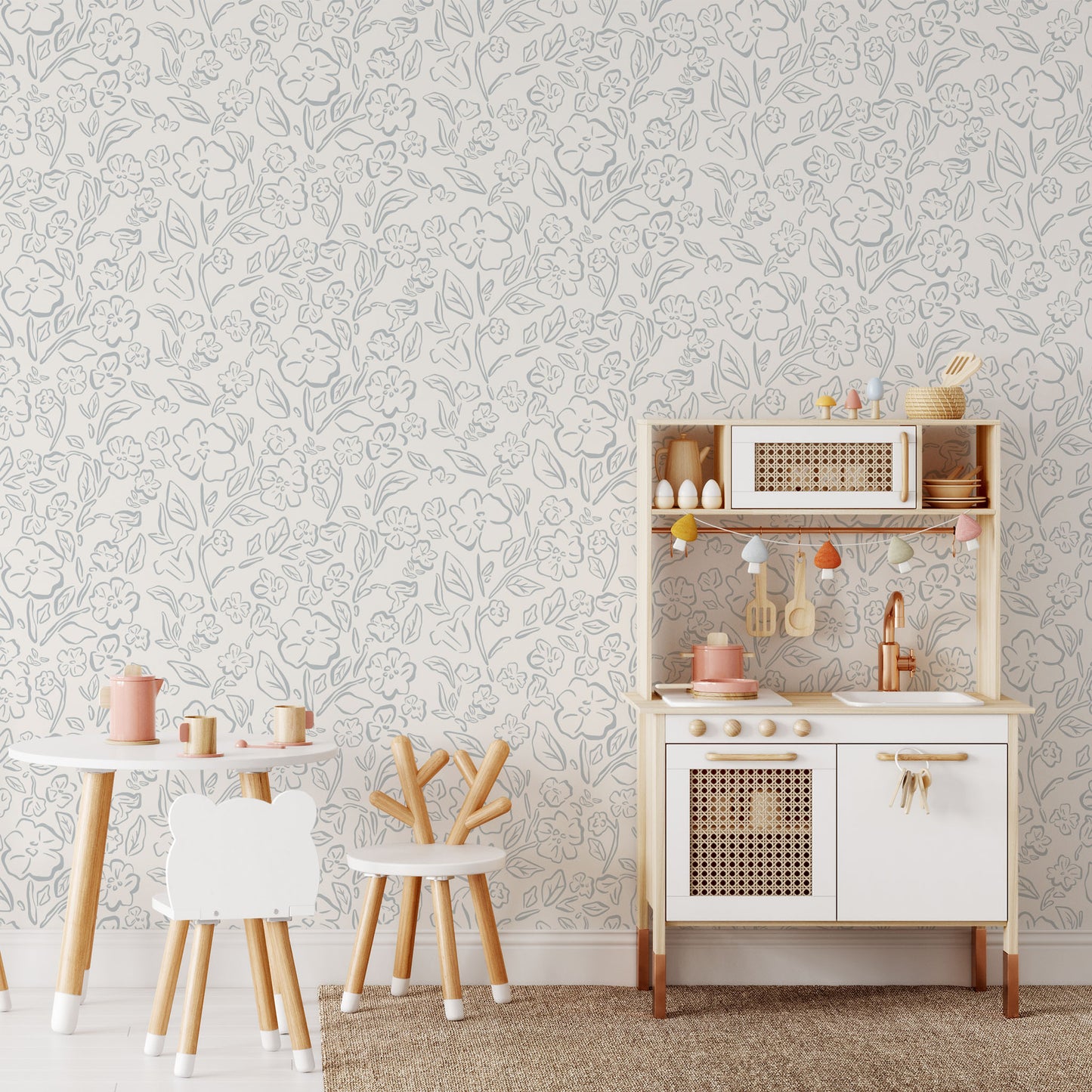This Beverly Wallpaper in blue offers a stylish and feminine touch with its delicate floral design shown in full size image.