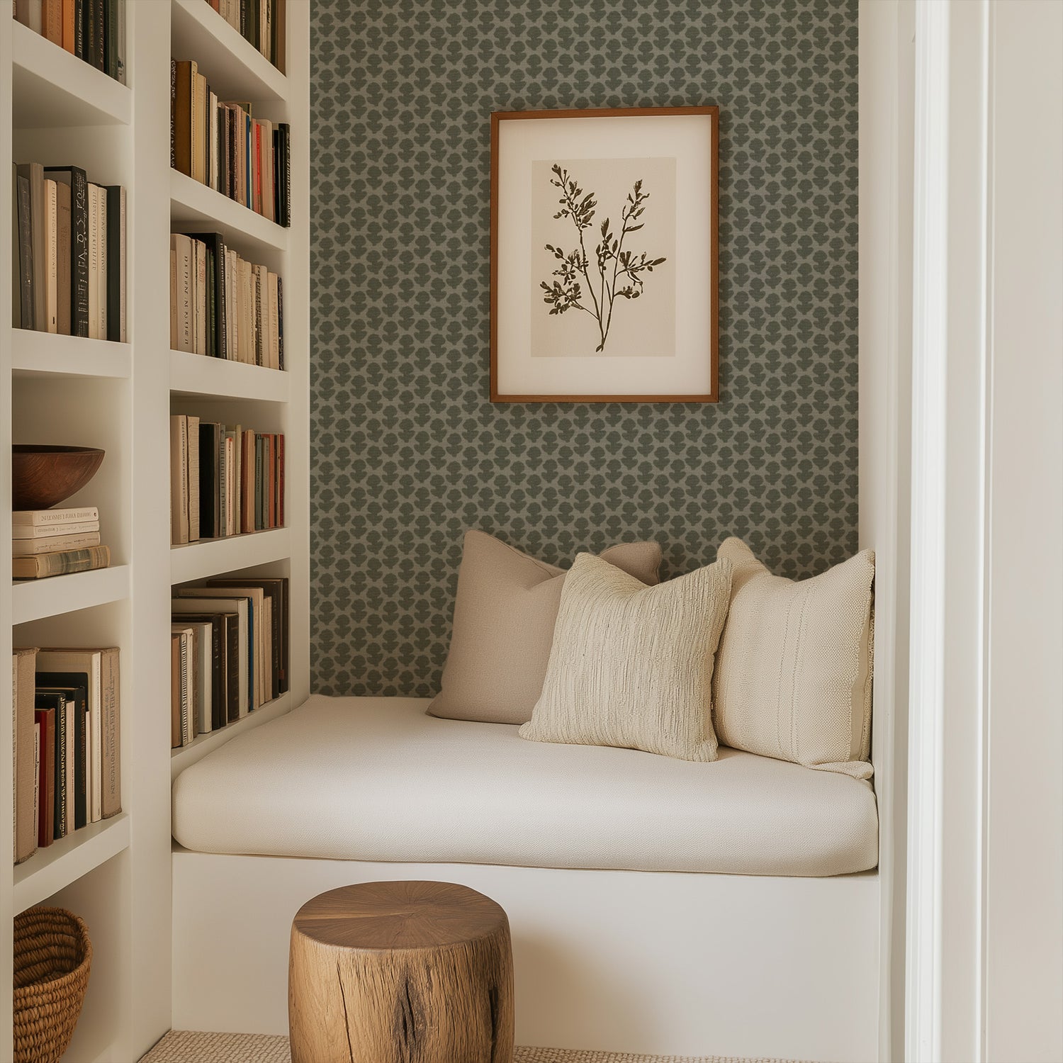 Block Printed Floral Wallpaper in Green shown in a reading nook.