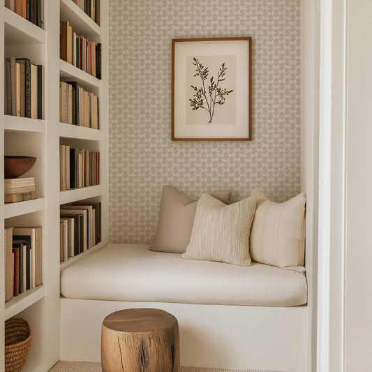 Block Printed Floral Wallpaper in Neutral shown in a reading nook.