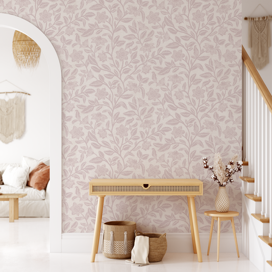 Block Printed Floral Vines Wallpaper in Rose shown in a living area