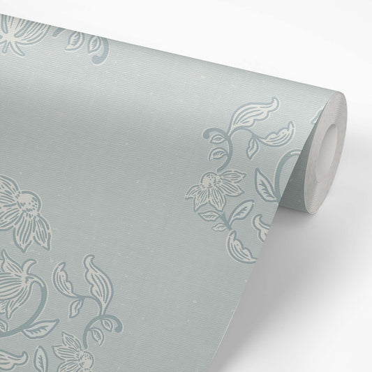 Blooming Block Print Wallpaper in Cloudy Blue shown on a wallpaper roll.