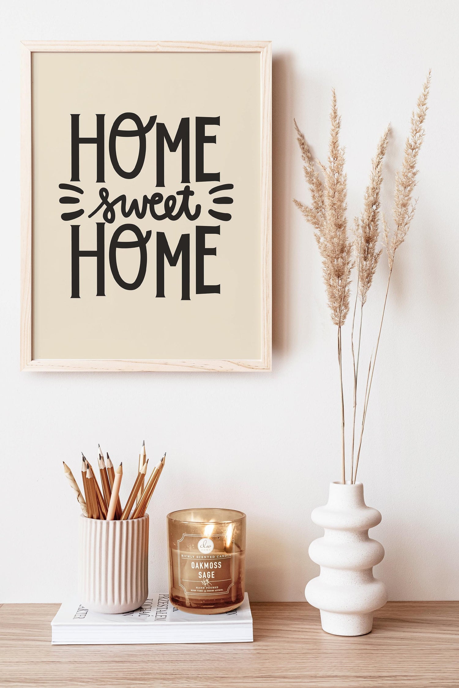 Home Sweet Home art print in Black by artist Brenda Bird pictured in an office